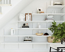 Система полок в нише под лестницей